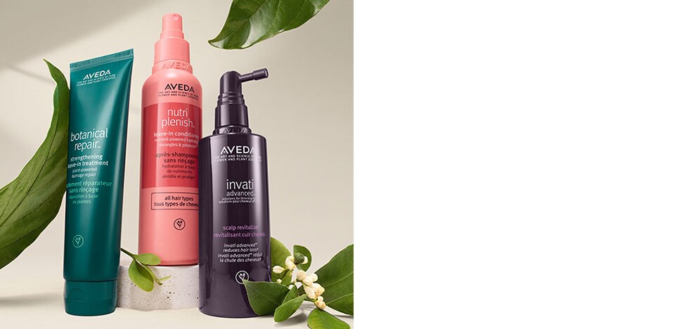 Hero product shot of botanical repair™ strengthening leave-in treatment, nutriplenish™ leave-in conditioner and invati advanced™