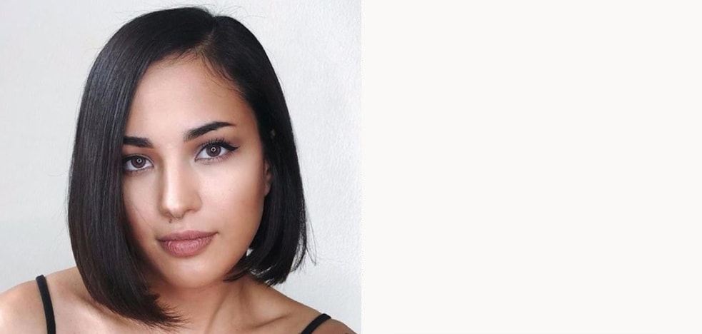 UGC image from Instagram, @avedaartists - brunette bob haircut.