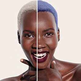 woman with coily hair using the hair color try on to show her hair with white color and the other side with blue