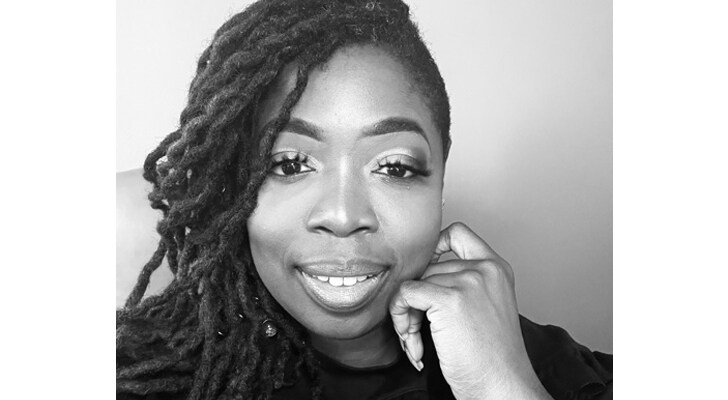 black and white headshot of Stacy Reid